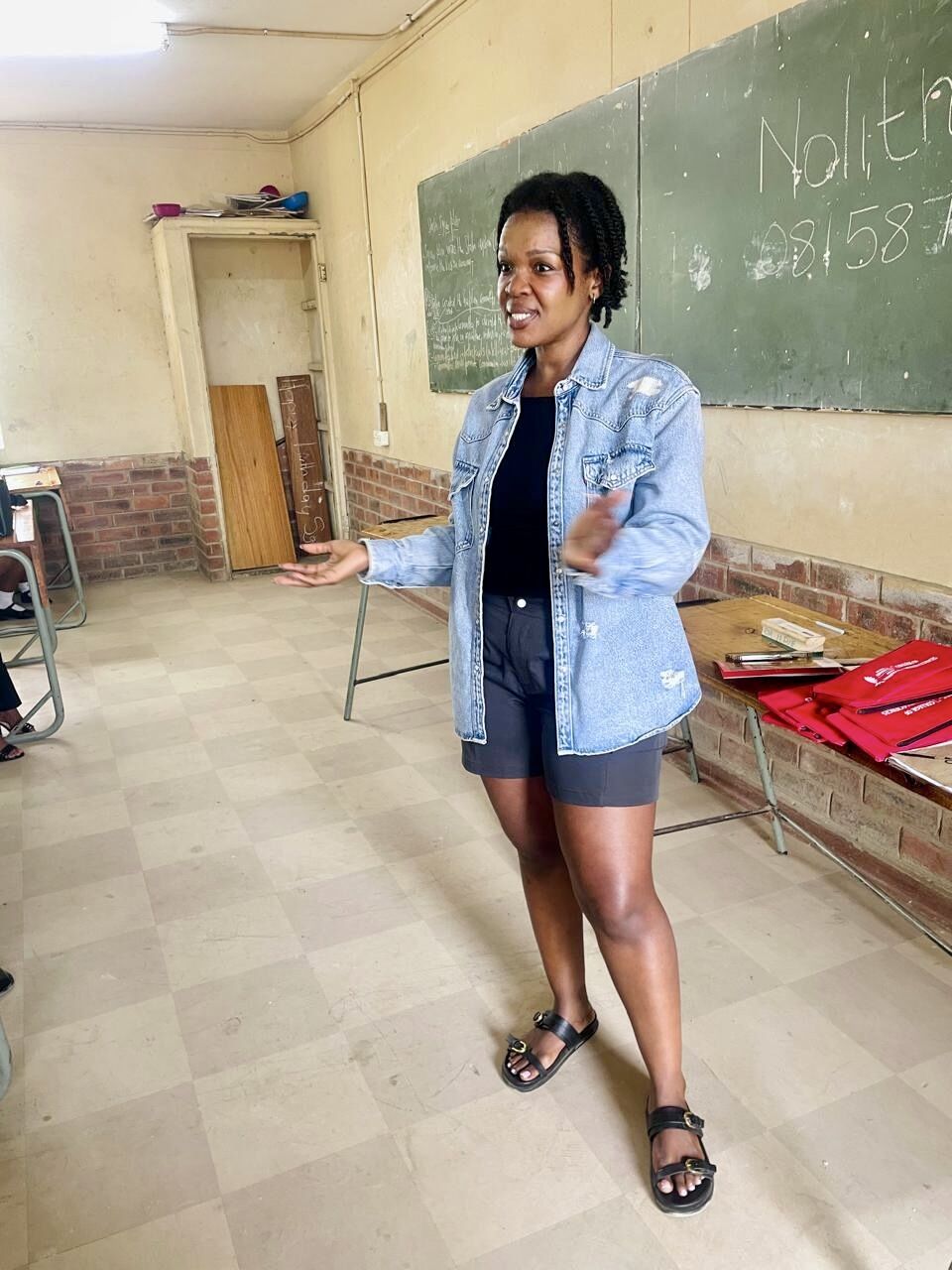 Zama Buthelezi speaking during a career day at Ekwazini